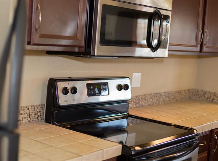 Refridgerator with Ice Maker at The Towers Apartments, NM, 87109