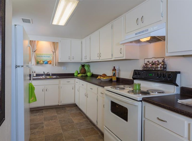 Spacious Kitchen with Pantry Cabinet at The Towers Apartments, 5404 Montgomery Boulevard NE, NM
