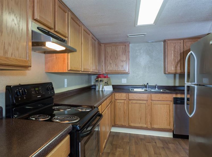 Gourmet Kitchen with Breakfast Bar and Pantry at The Towers Apartments, NM, 87109
