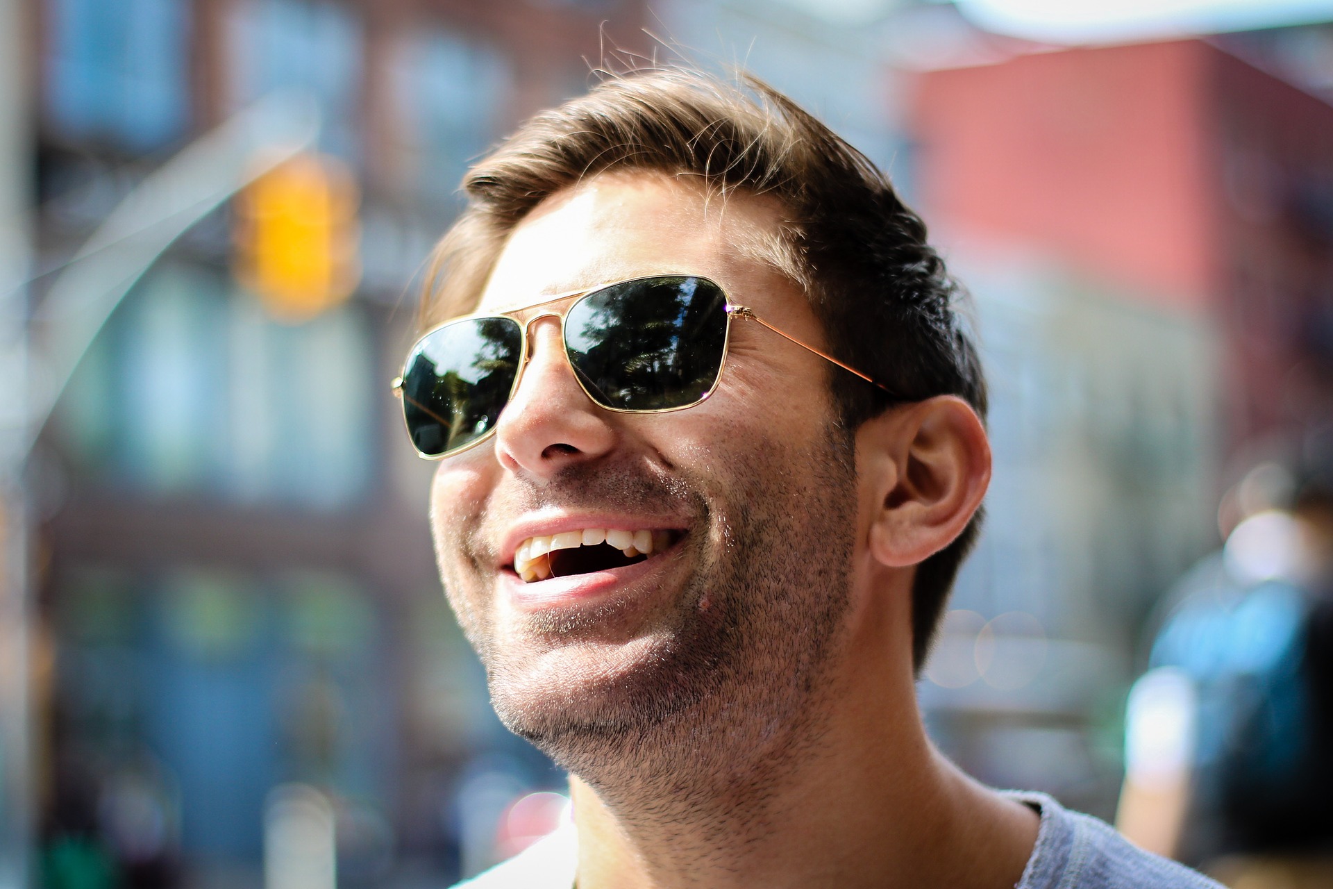 man smiling in the sun