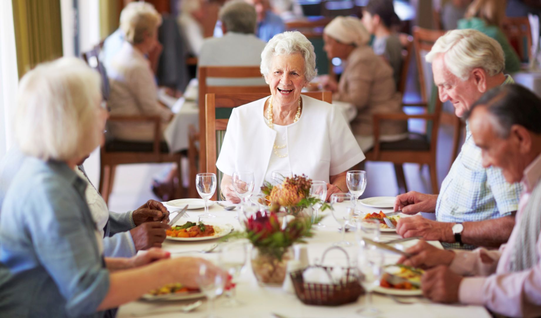 Seniors enjoy a healthy meal at their Pacifica Senior Living community. 