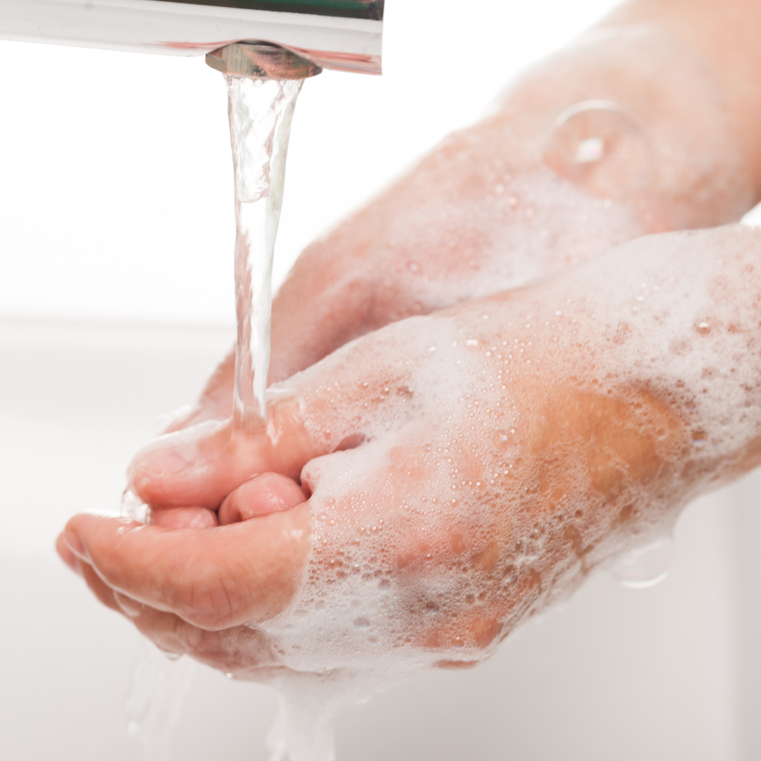 How to Stay Healthy This Fall in Your Charlotte Apartment-washing hands | Phillips Mallard Creek