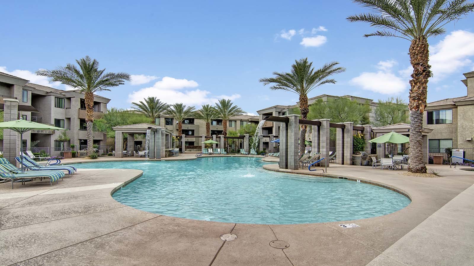 The outdoor pool at our beautiful Phoenix apartment space, Aspire at Pinnacle Peak.