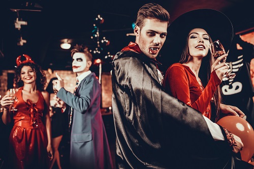 young couple at Halloween party