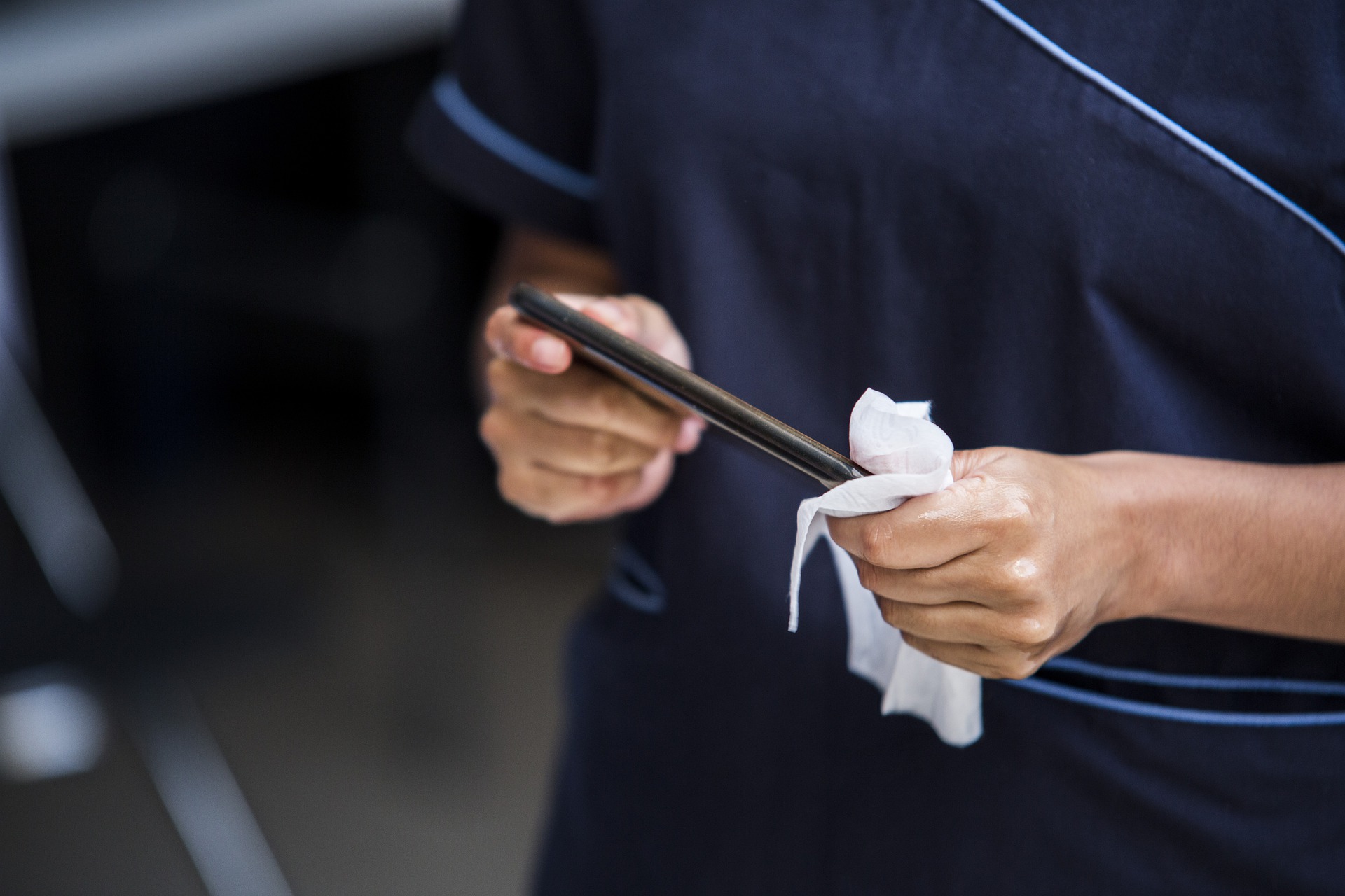 man sanitizing 