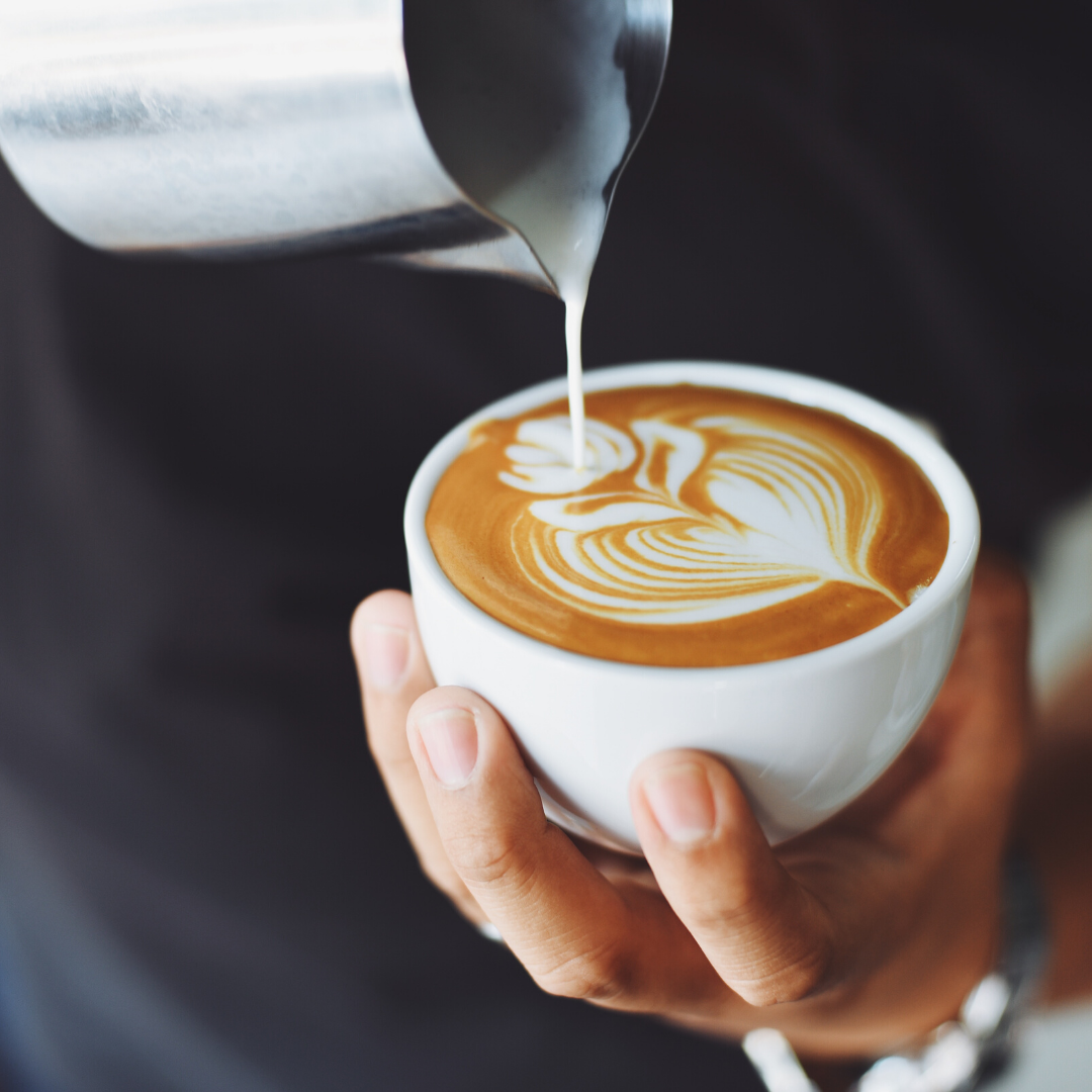 Pouring milk into coffee | Villas at Mallard Creek Apartments