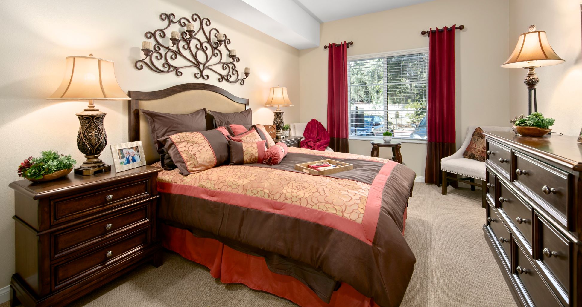 One of the luxurious bedrooms at Pacifica Senior Living Oceanside. 