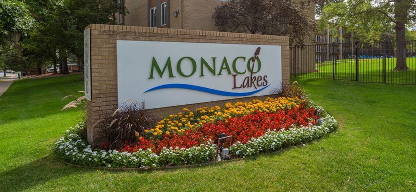 Welcoming Property Signage at Monaco Lakes, Denver, CO, 80222 - Photo Gallery 1