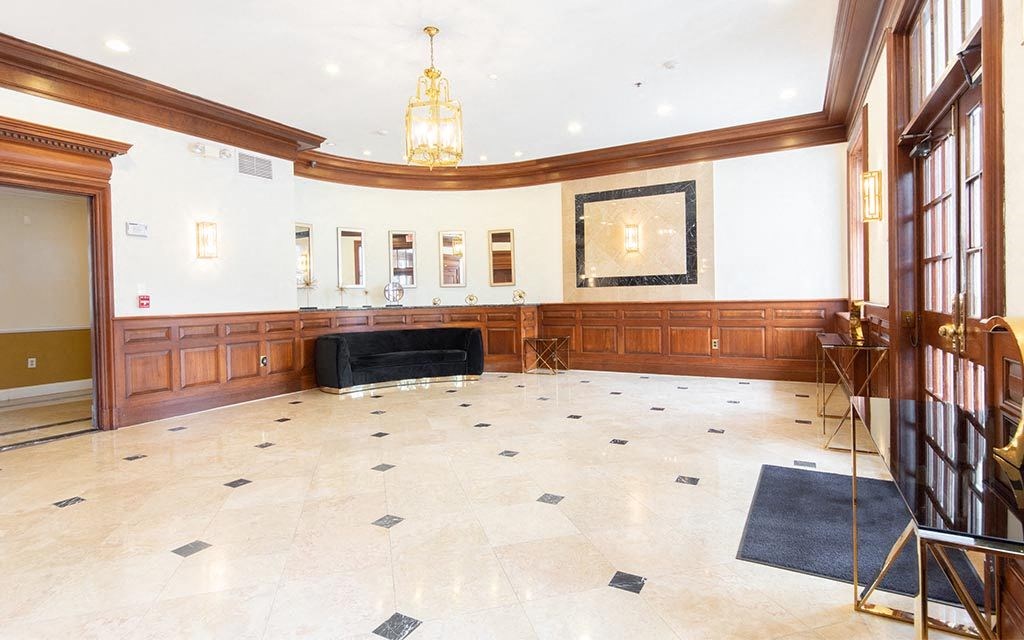 a large room with a couch in the middle