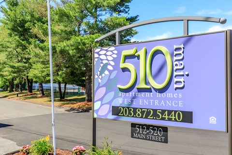 A sign for apartment homes with the number 510 on it.