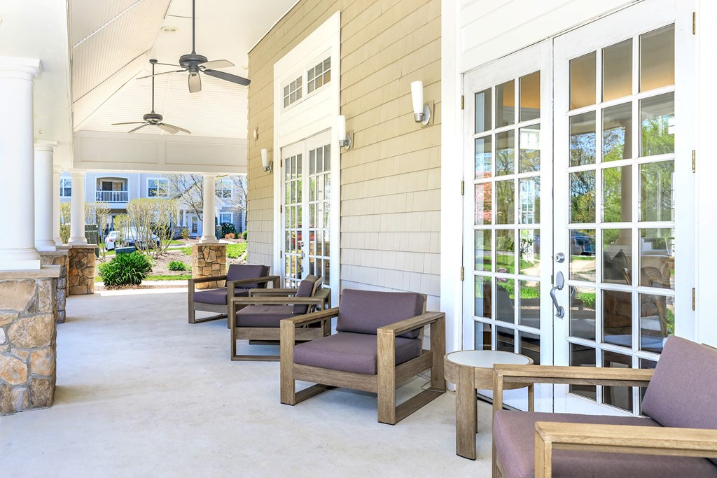 A patio with a table and chairs is shown.