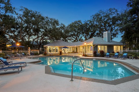 A house with a pool in the backyard.
