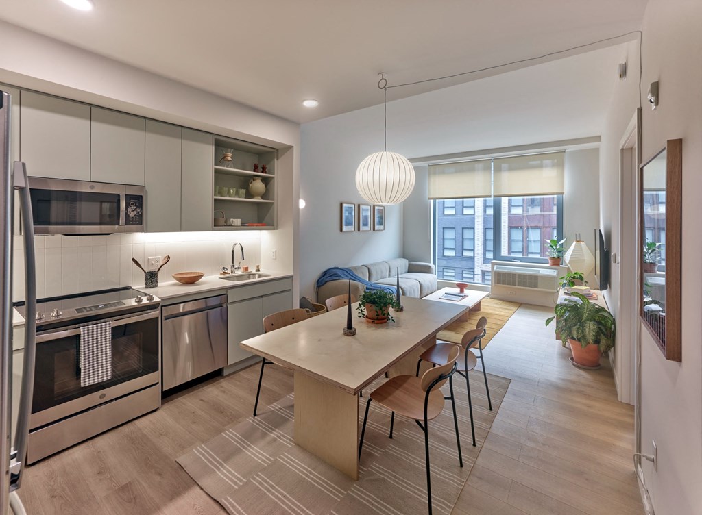 The kitchen at The Hazel is a modern culinary haven, featuring sleek designs, top-of-the-line appliances, and ample counter space