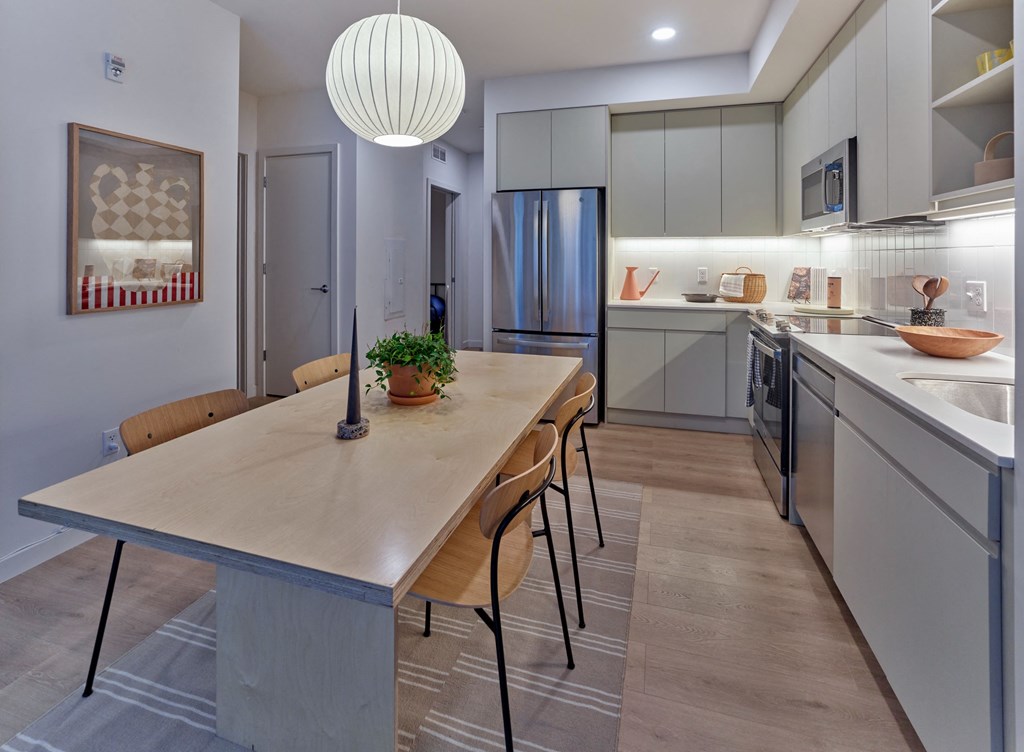 The Hazel is a modern culinary haven, boasting sleek finishes, top-of-the-line appliances, and ample counter space