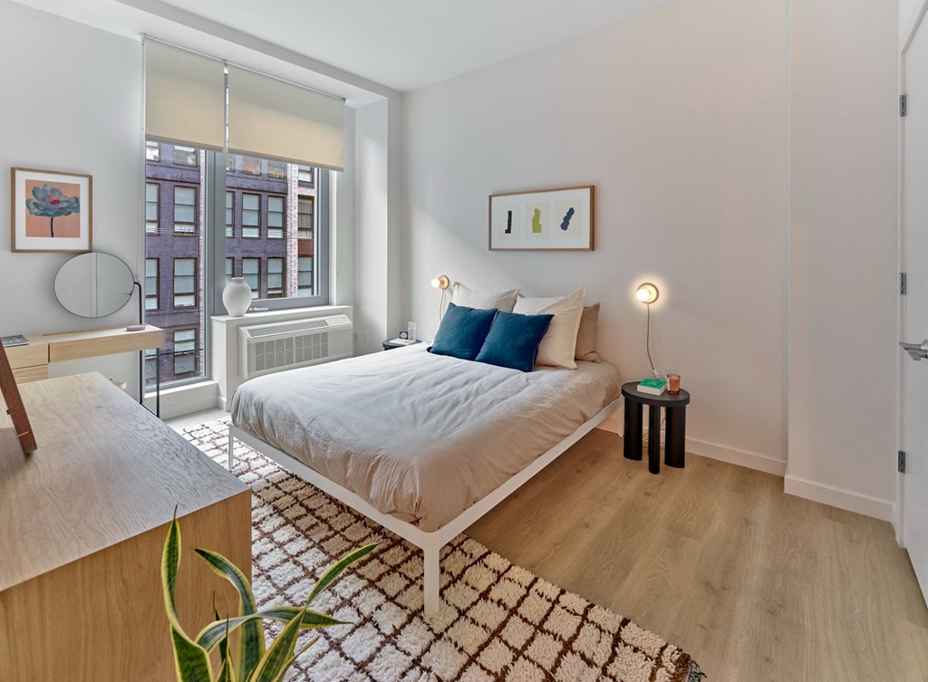 The bedrooms at The Hazel are inviting sanctuaries, featuring spacious layouts, cozy atmospheres, and thoughtfully designed elements