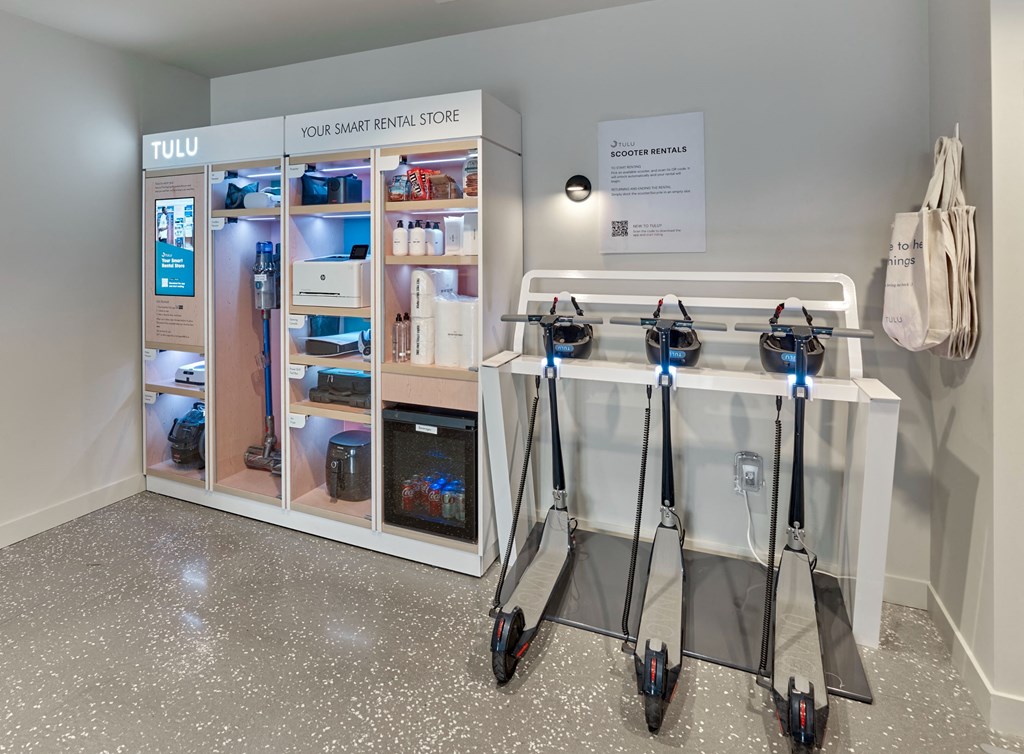 a display of skis in front of a refrigerator