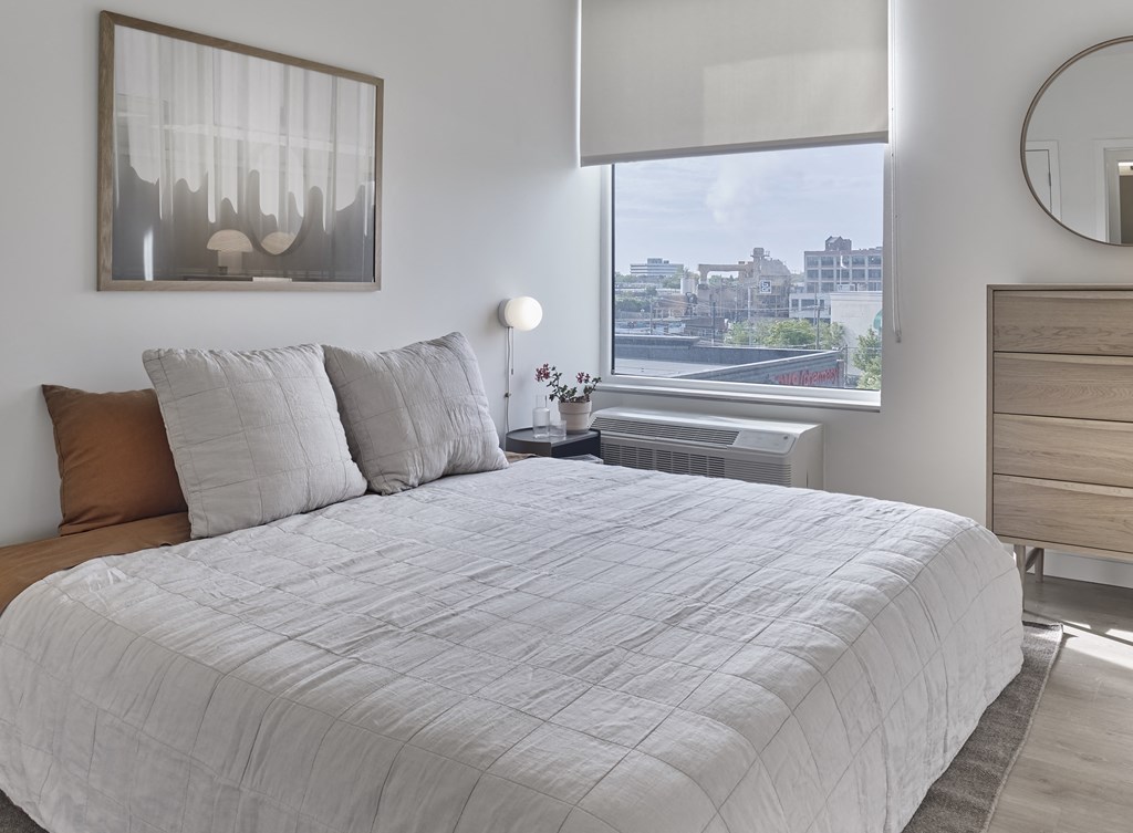 The spacious bedrooms are a tranquil haven, combining luxury and relaxation.