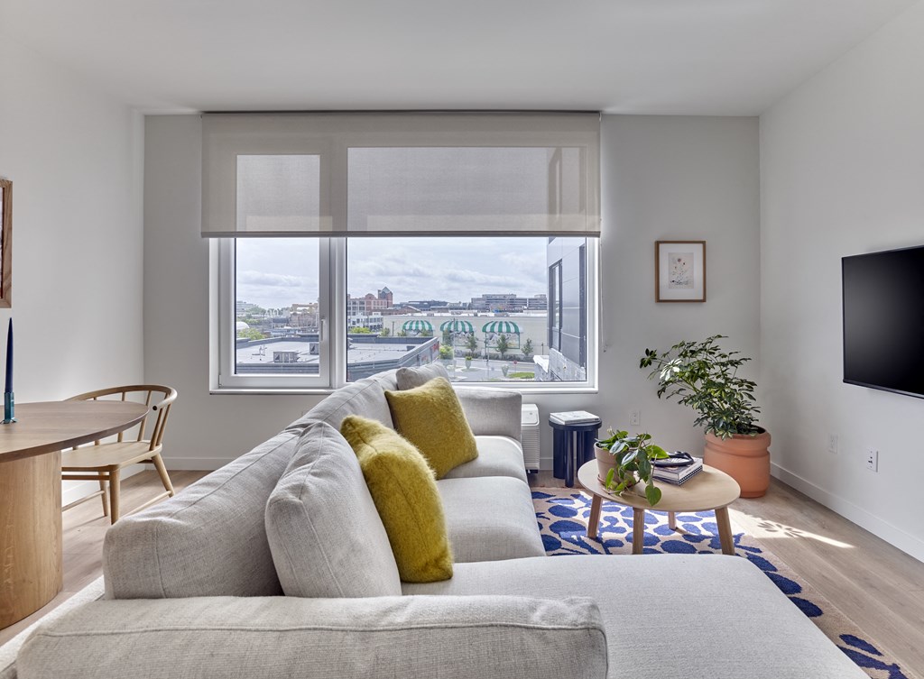 Spacious living rooms offer residents stunning views and a serene connection to the outside world.