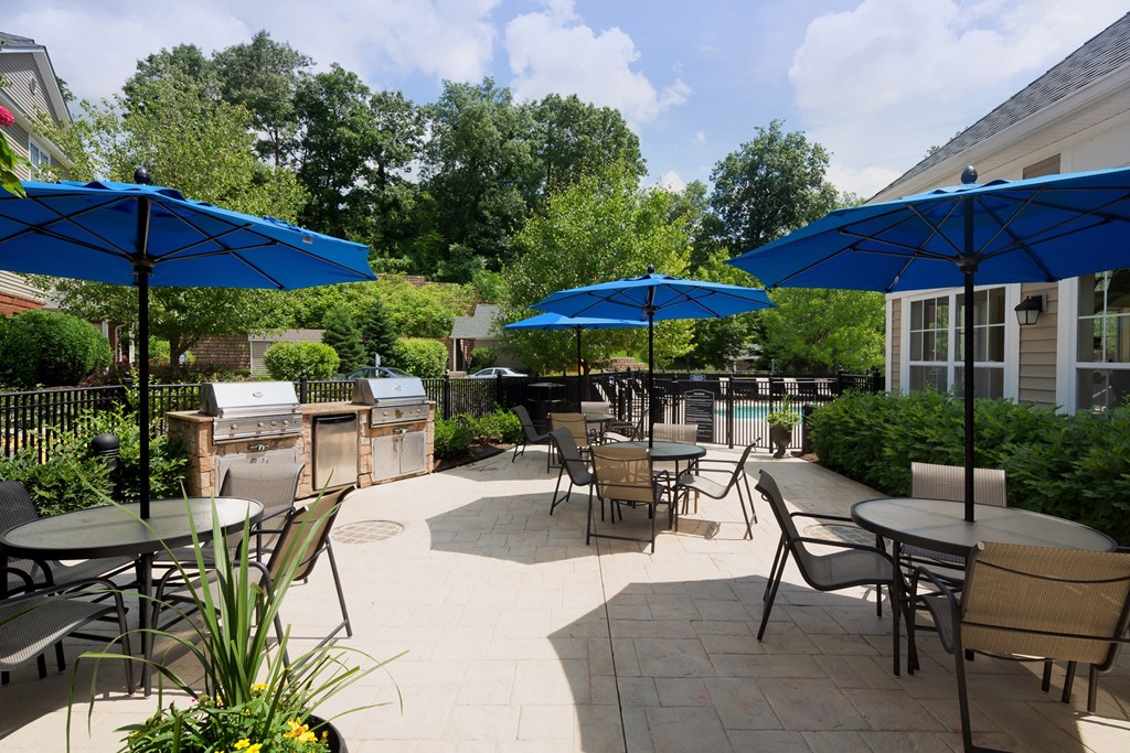 Patio with outdoor seating & gas grills