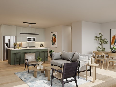 A modern living room with a kitchen area in the background.