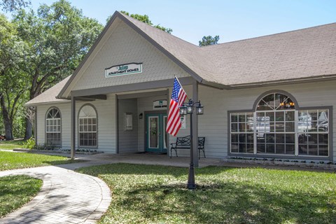A small building with a sign that says "Kinship" on it.