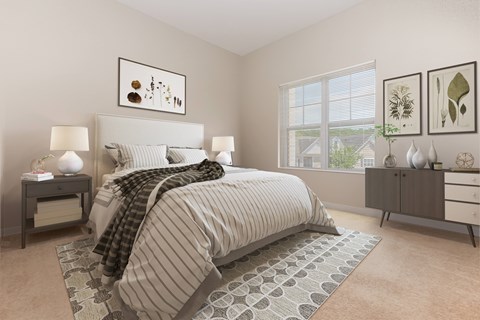A bedroom with a large bed and a window.