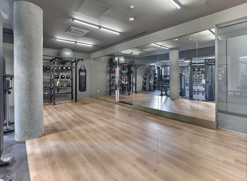 The flex area in the gym at The Hazel offers a versatile space where residents can engage in a range of activities, from stretching and functional training to yoga