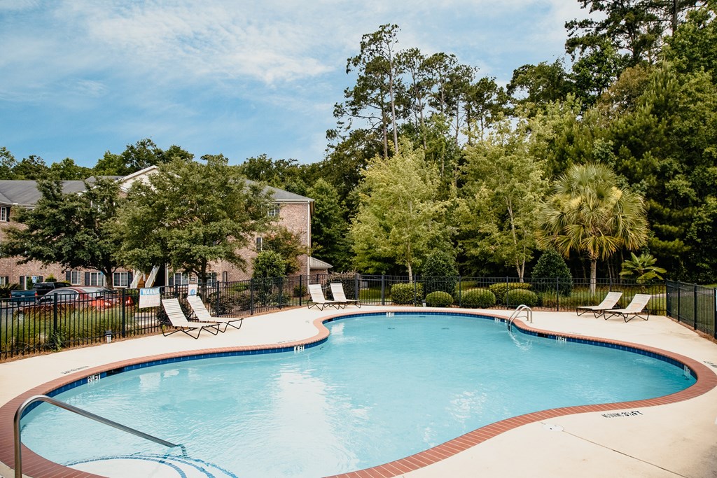 our apartments have a resort style pool with chairs