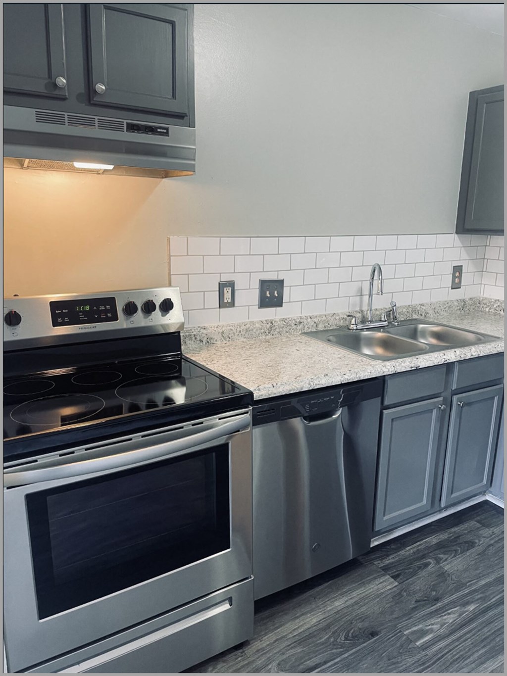 Kitchen with appliances at Ashford Place Apartments in Kannapolis, NC 28081
