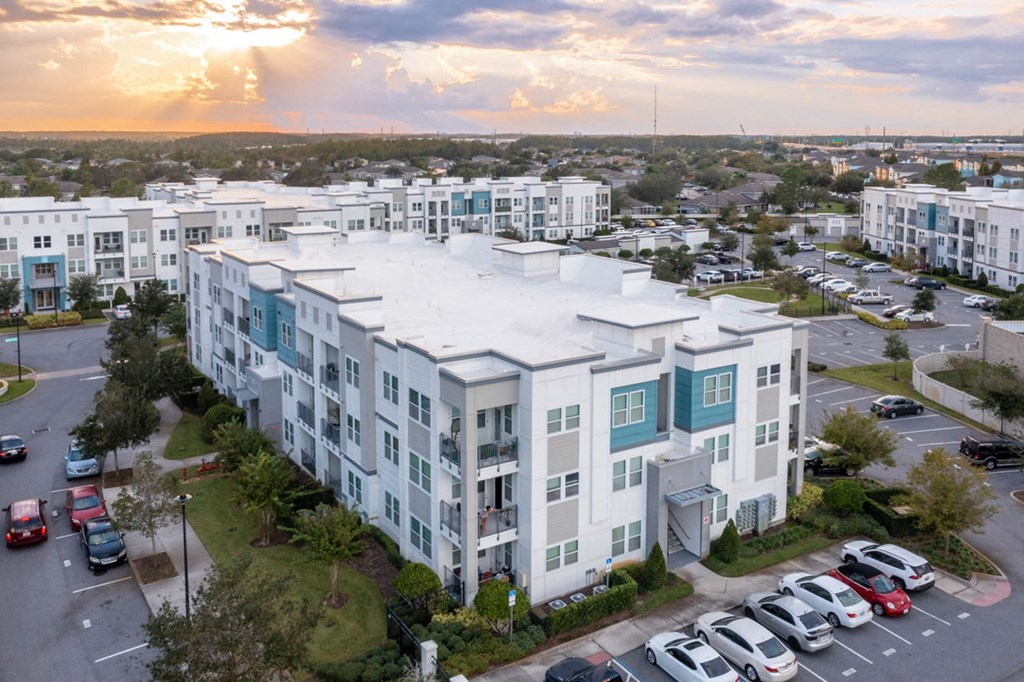an aerial view of a building and a parking lot  at Linden on the GreeneWay, Orlando