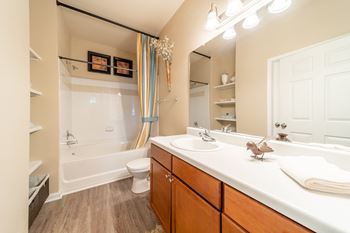 Bathroom With Vanity Lights at Rose Heights Apartments, Raleigh