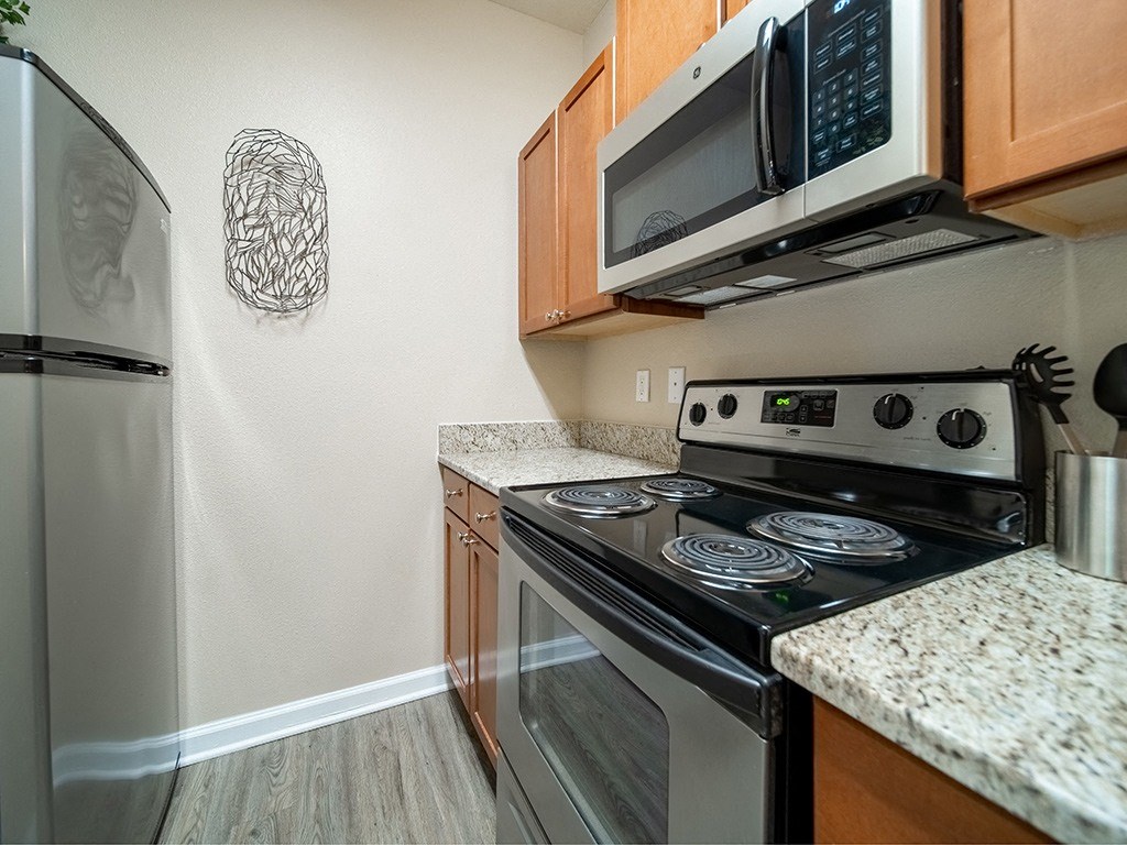Electric Range In Kitchen at Rose Heights Apartments, Raleigh, North Carolina