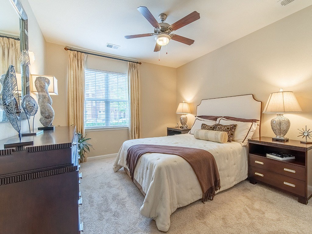 Comfortable Bedroom With Large Window Comfortable Bedroom With Large Window at Rose Heights Apartments, Raleigh, 27613