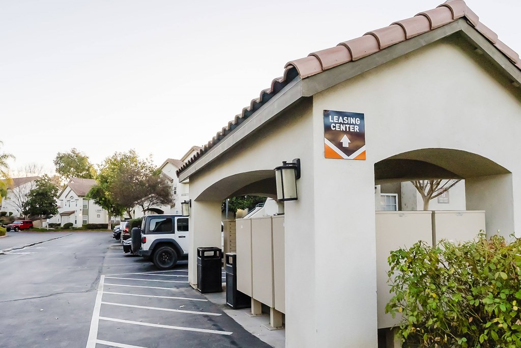 A leasing center with a parking lot in front. at Legends at Rancho Belago, Moreno Valley, CA, 92553