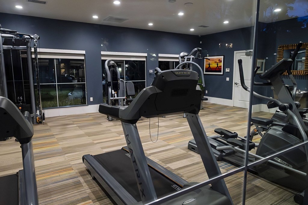 A gym with treadmills and exercise equipment. at Legends at Rancho Belago, Moreno Valley, CA, 92553