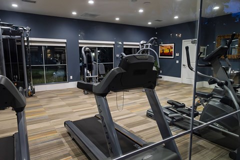 A gym with treadmills and exercise equipment. at Legends at Rancho Belago, Moreno Valley, CA, 92553