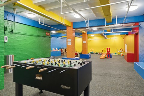 A black pool table with the word "Clue" written on it.