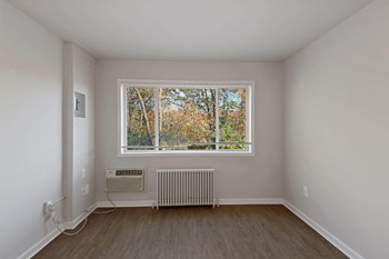 Room with window at South Pointe Apartments in Temple Hills, MD Room with window - Photo Gallery 4