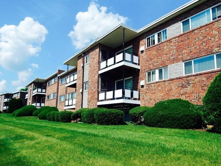 Green grass and apartment balconies