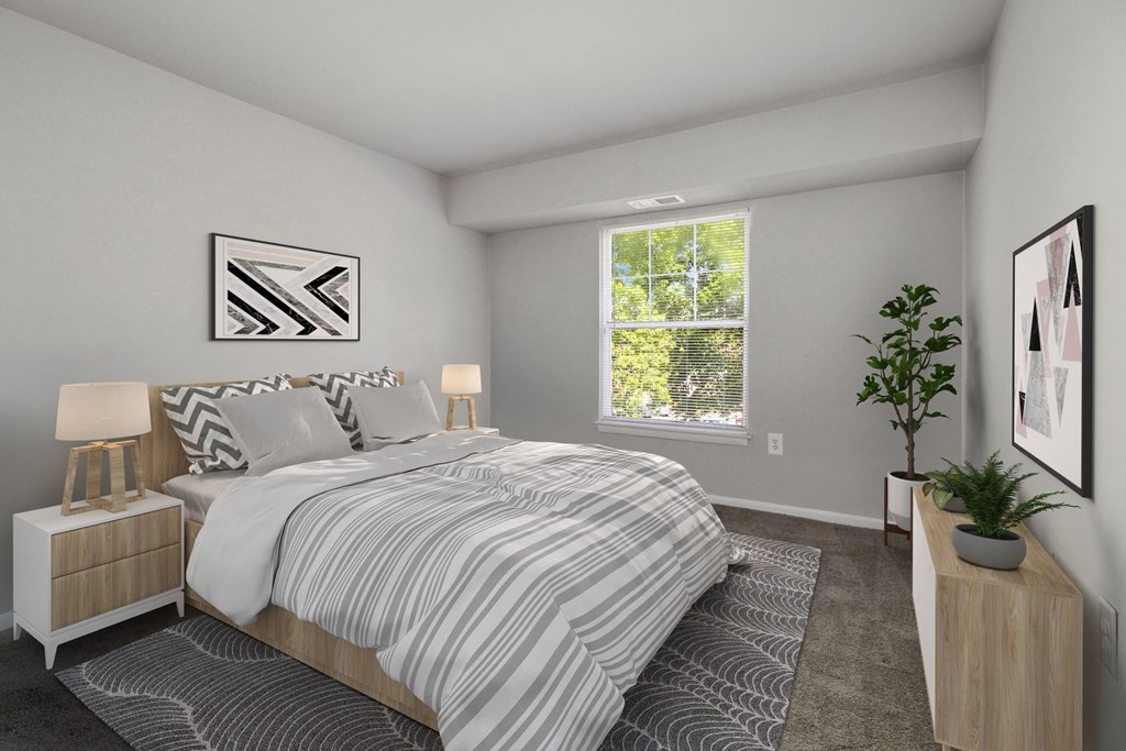 an open bedroom with a bed and a window