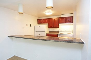 Breakfast bar attached to kitchen at The Glen Apartments in Falls Church, VA Breakfast bar attached to kitchen - Photo Gallery 3