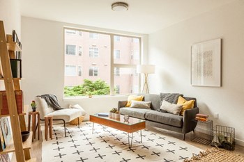 spacious living room with large windows