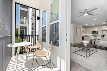 Apartment balcony with table and chairs at Mira at Palmer Ranch, Florida, 34238