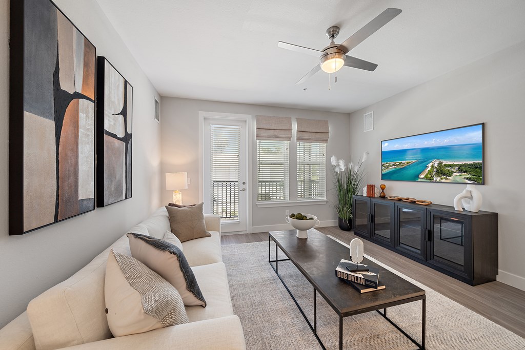 A modern living room at Mira at Palmer Ranch, Florida