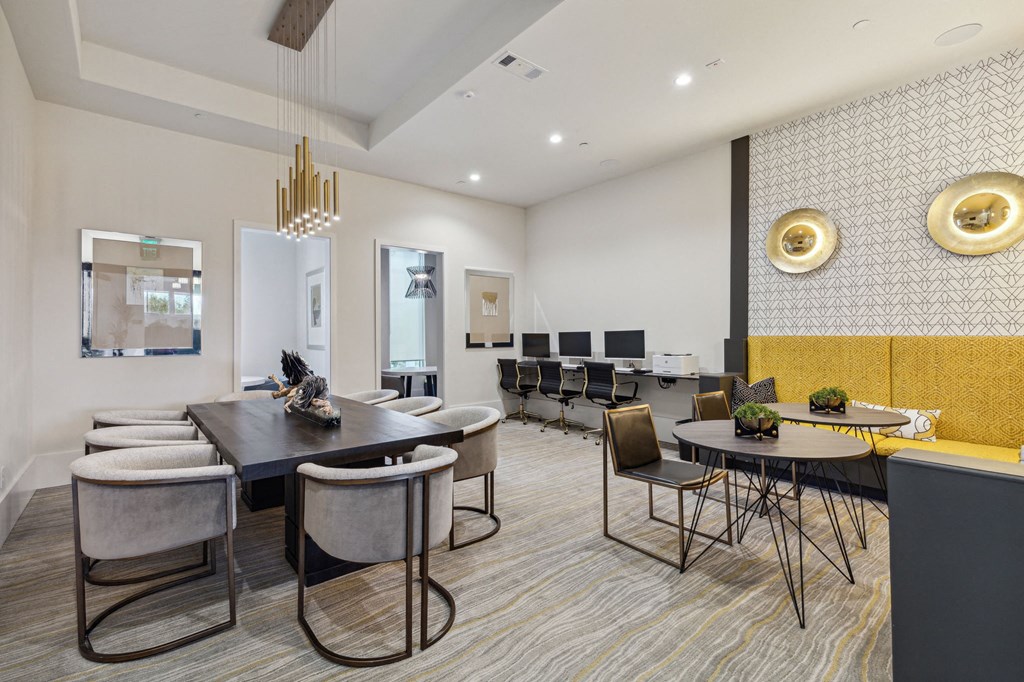 Resident lounge area with tables and chairs at LynnCora, Texas