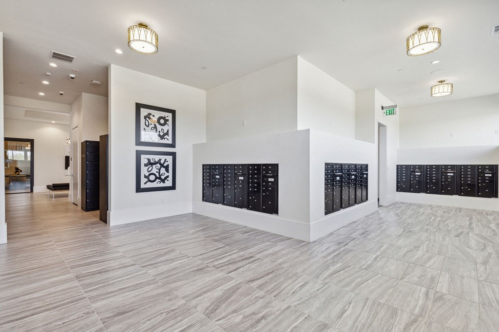 a large room with white walls and a large wall calendar on the wall and a at LynnCora, Grand Prairie