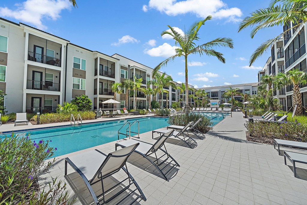 Pool With Lounge Chairs at Mira at Palmer Ranch, Florida, 34238