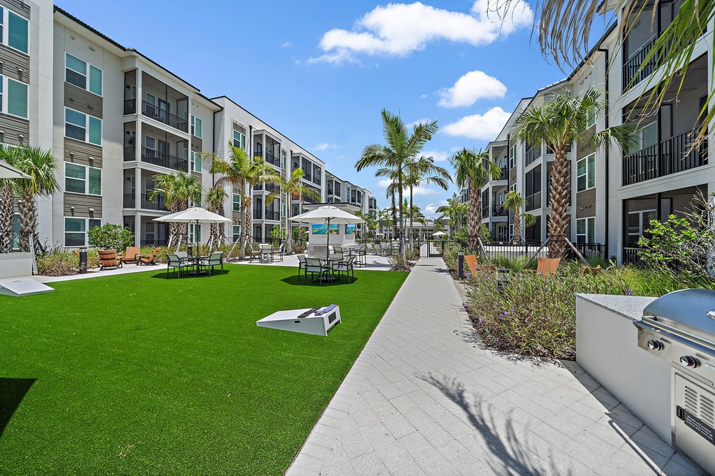 well-maintained lawn. at Mira at Palmer Ranch, Florida