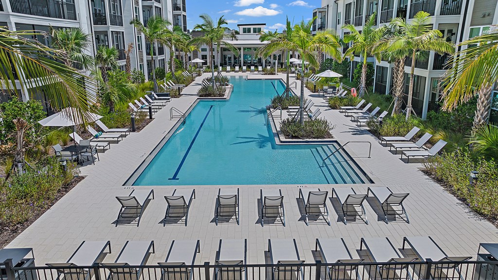 A large outdoor swimming pool  at Mira at Palmer Ranch, Sarasota, FL, 34238