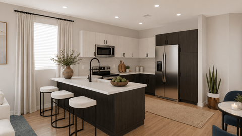 A modern kitchen with a bar stool and a refrigerator.